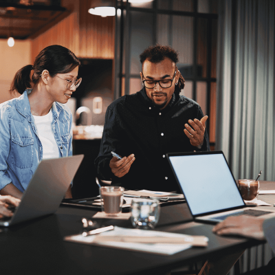 Man and woman collaborating in a meeting